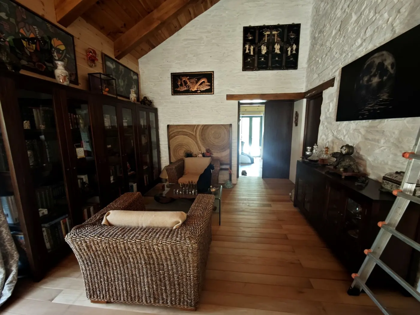 The library room, stone walls and timber floor